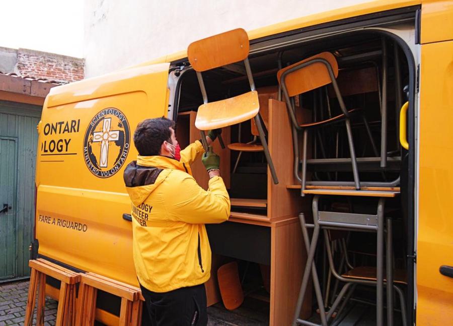 Volunteer Ministers from the Church of Scientology of Padua filled their bright yellow van with desks and chairs to help for a school in Glina damaged by the earthquake.