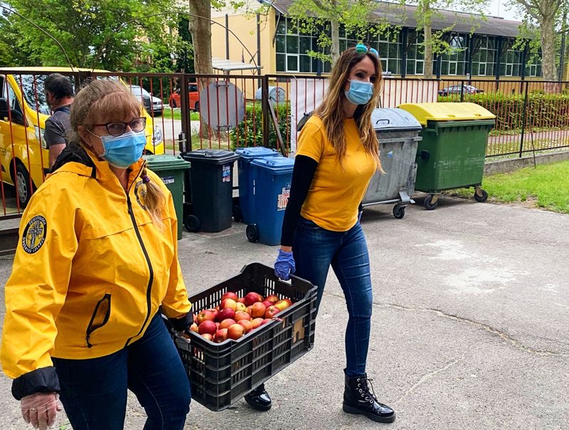 Crates of apples—a huge hit with 500 underserved kids at a local school.