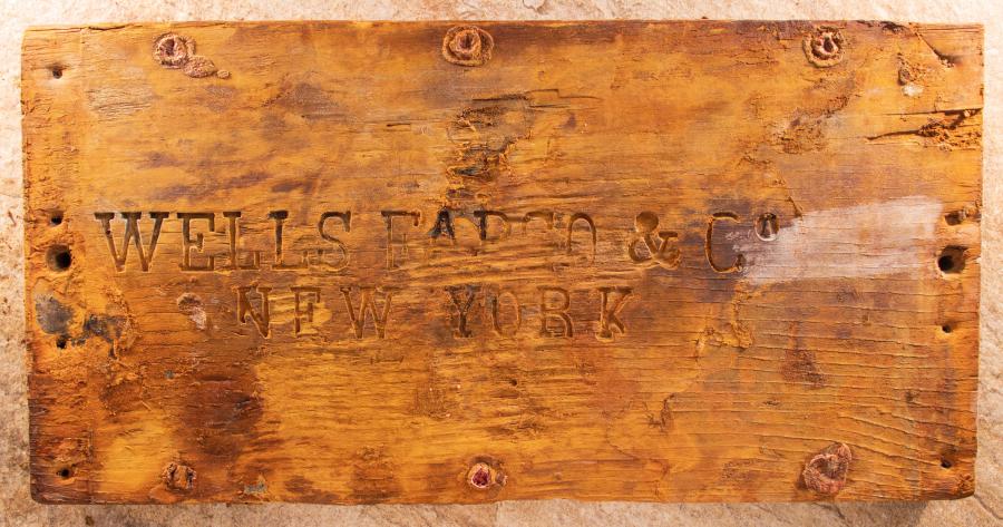 The lid to the oldest known Wells Fargo treasure shipment box, recovered from the fabled “Ship of Gold,” the S.S. Central America that sank in 1857, was sold at auction for $99,600 by Holabird Western Americana Collections in Reno, Nevada on December 3, 2