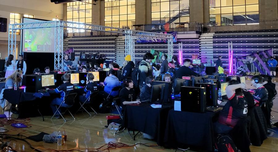 Esports athletes compete on the basketball court inside Illinois College's Bruner Fitness and Rec Center.