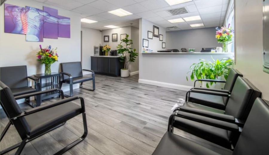 The newly renovated waiting room at Mandarino Chiropractic's Long Island location reflects the up-to-date concept of the high-tech, modern office.
