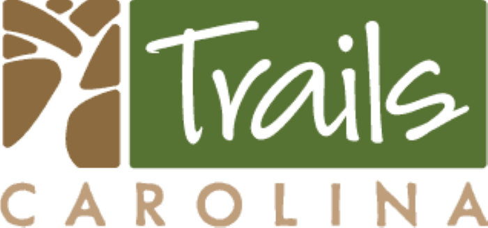 Trails Carolina, a leading therapeutic wilderness program for youth and teenagers located in Lake Toxaway, NC, in Transylvania County, is proud to announce the participation of their clinical team members in a Mental Health and Wellness Day at AC Reynolds Middle School Trails Carolina Logo in Green and Brown
