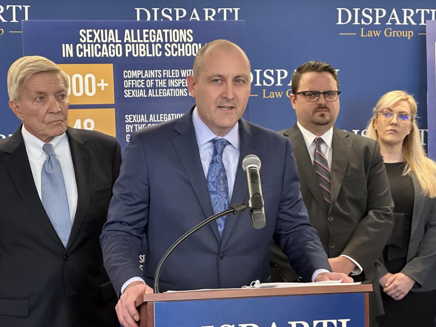 Attorney Larry Disparti addresses the media