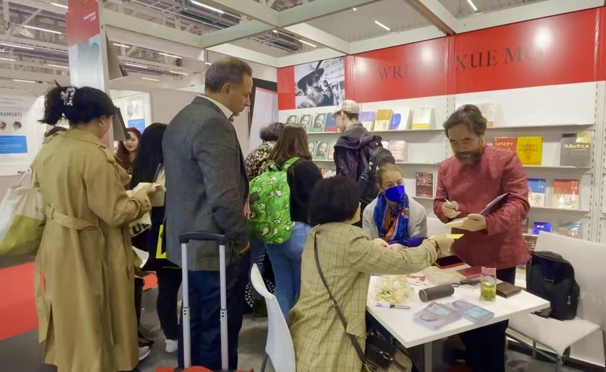 Bustling book signing scene at 2023 Frankfurt Book Fair