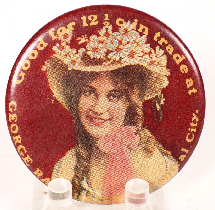 Rare George Rasmussen's (“Good For 12 ½ cent in trade at / George Rasmussen’s / Central City / Colorado”), unlisted in Dunn, 2.2 inches in diameter, in nice condition (est. $600-$1,200).