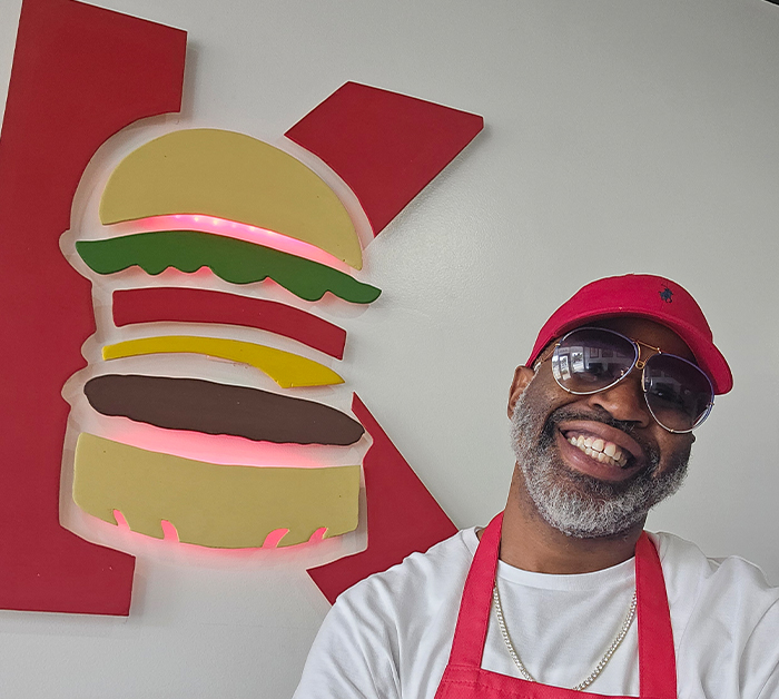 In an exciting culinary milestone, South Florida’s beloved radio personality, Alex “Big Lip” Chisholm of Cox Media Group’s Hot 105-FM, has announced the grand opening for The Krazy Vegan’s second location this weekend at 18421 Miramar Parkway in Miramar, FL