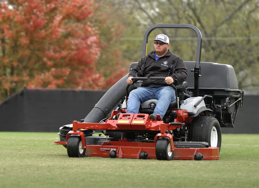 Eric Varner of Varner's Lawn Service mowing one of the many sports fields he's contracted to maintain.