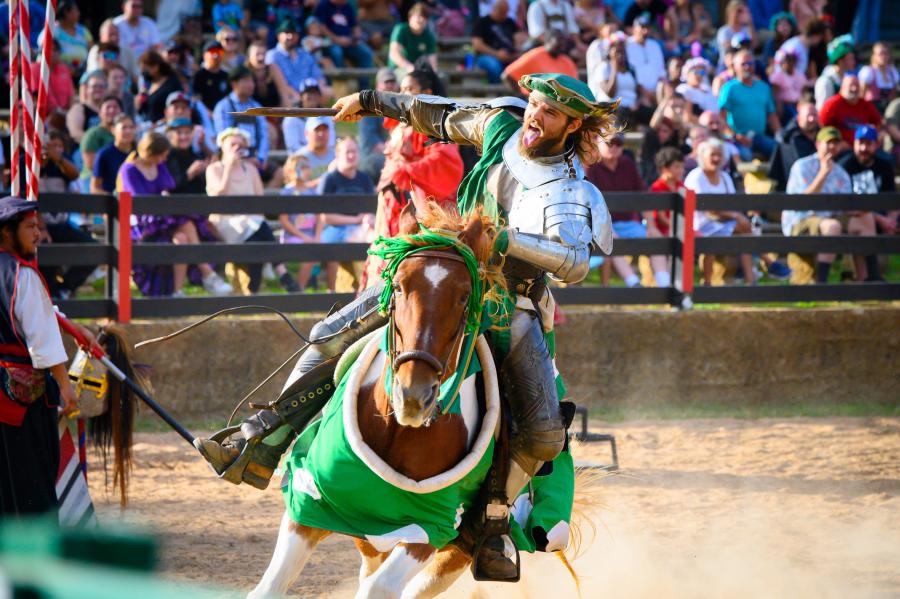 Image of man in Renaissance costume on a horse. Caption says: The Texas Renaissance Festival is celebrating 50 years of the nation’s largest and most acclaimed Renaissance themed event. Established in 1974, the event attracts over half a million visitors 