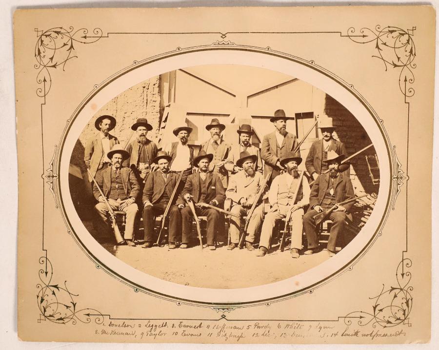 Circa 1880 mounted original albumen photograph of the 13-man posse that was sent from Tucson to Yuma, Arizona to arrest one of the Goldwater brothers for fraud ($8,750).