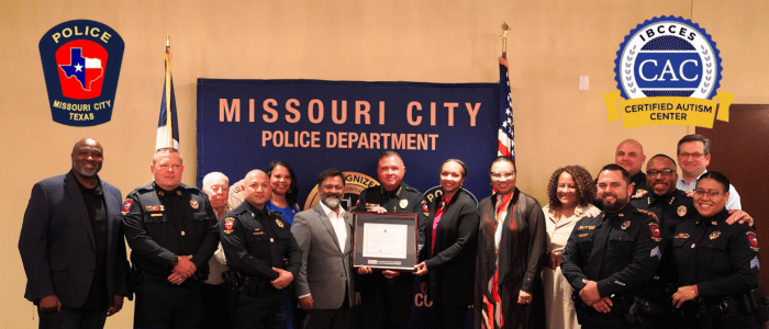 Staff and police officers of Missouri City Police Department holding their Certified Autism Center™ certification from IBCCES.