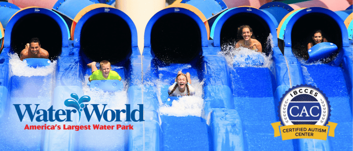 A group of people enjoys water slides at Water World Colorado, America's largest water park, which is a Certified Autism Center™.