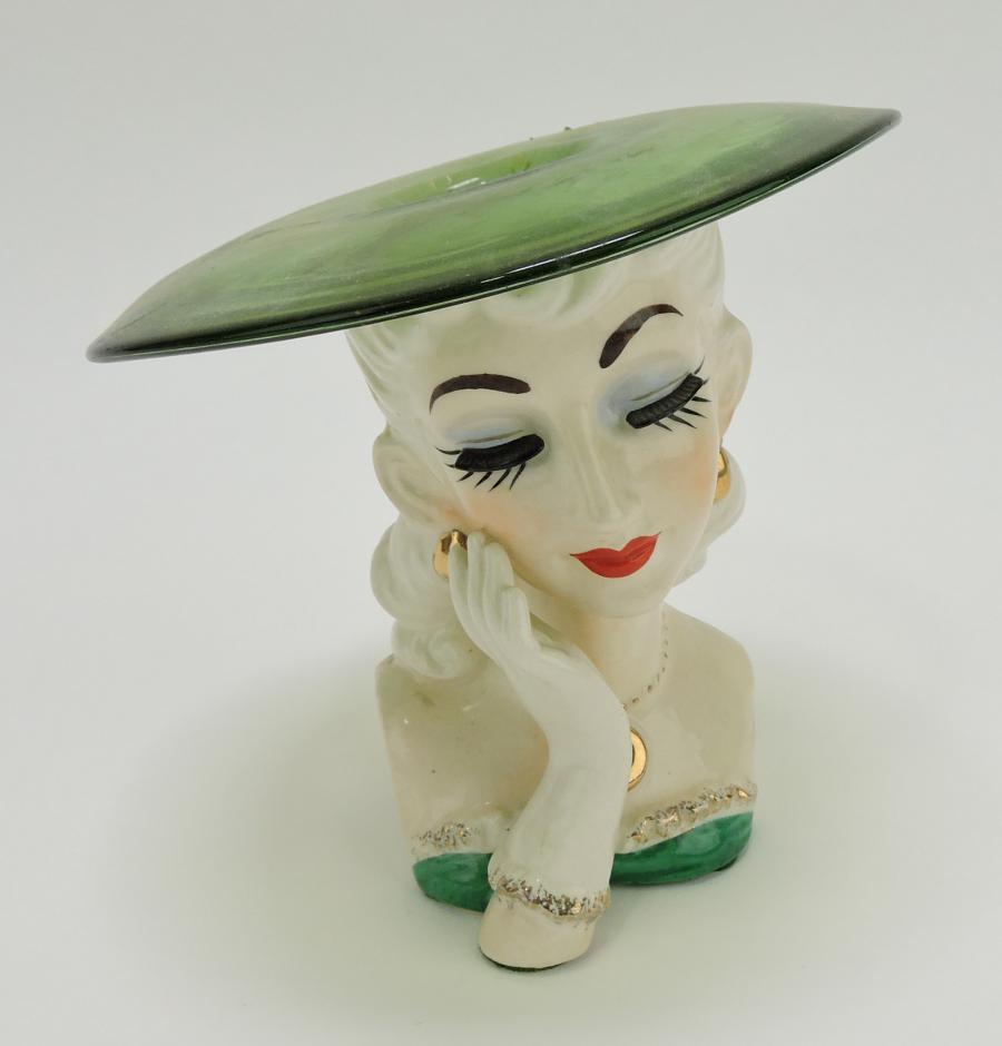 Napco lady head vase with glass hat, 6 inches tall. Estimate: $400-$600; minimum bid $1.