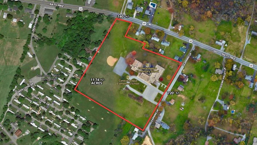 11.74± acres and a 26,000± sq. ft. former school building with business zoning in Hagerstown, MD