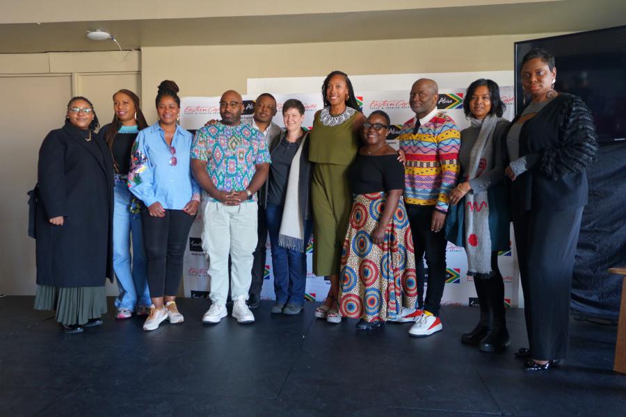  Participants of the US Media Fam Trip meet with Vuyani Dayimani, CEO of The Eastern Cape Parks and Tourism Agency, Itumeleng Pooe, owner and managing director of Afri-Centric, and event organizers at a press conference during the 50th Annual National Art