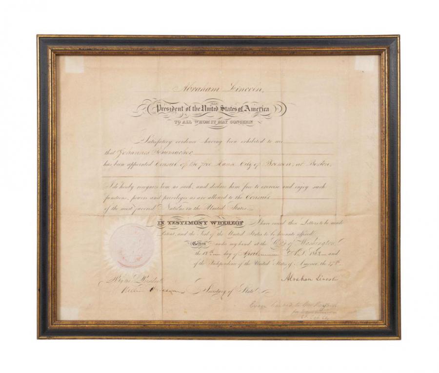Consulate appointment dated April 18, 1863, signed by President Abraham Lincoln using a dip pen, also signed by the U.S. Secretary of State William Seward, and accompanied by a JSA ($12,100).