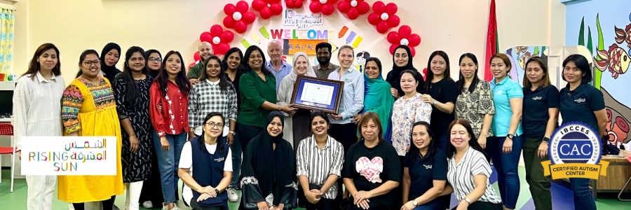 Staff members at The Rising Sun Centre being awarded the CAC certificate.