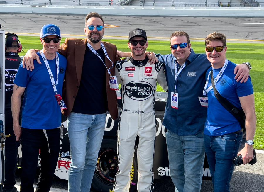 Tanner Gray and some of the team from Broadstreet Infamous in the pits at Daytona