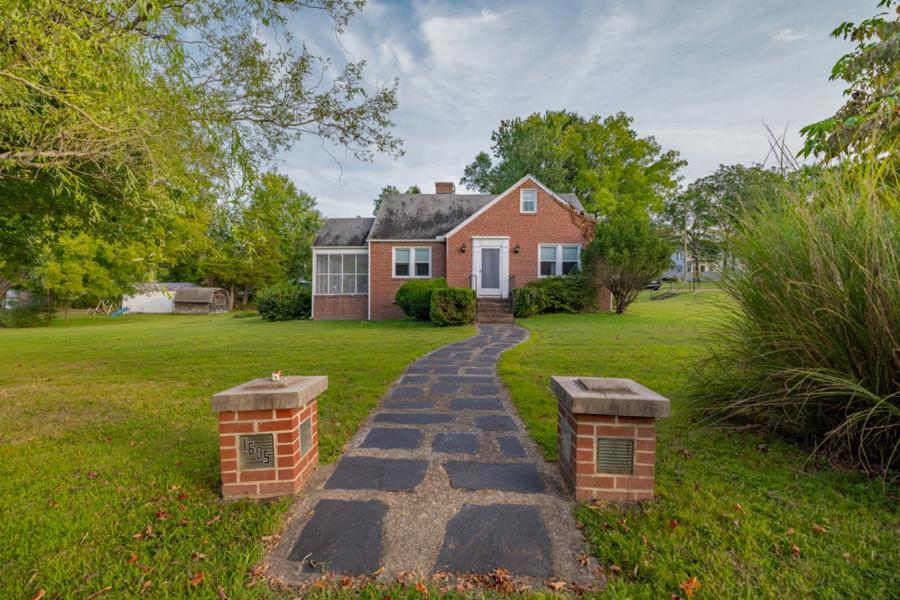 Well maintained 4BR/2.5BA brick home on .5± acre corner lot in Victoria