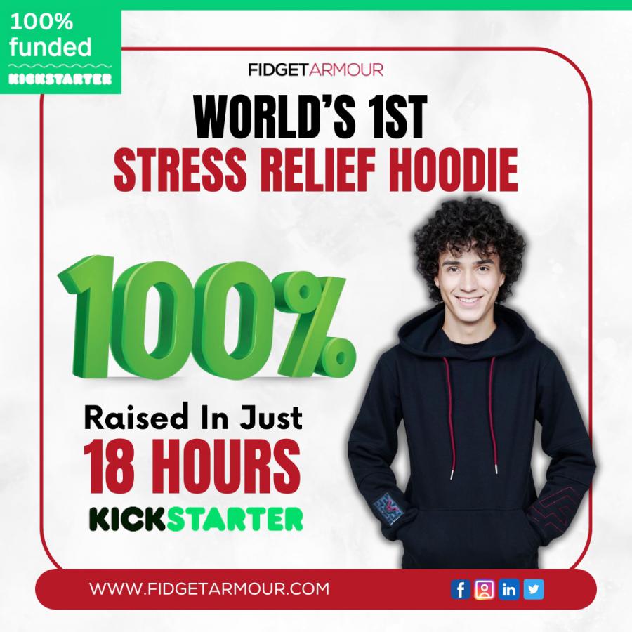 Fidget Armour Kickstarter success announcement. Image features the text 'World’s 1st Stress Relief Hoodie,' with '100% Raised in Just 18 Hours' in bold, alongside a young man wearing the Fidget Armour hoodie. Website URL and social media icons are display