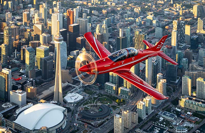 A PC-21 flies over Toronto, Canada, in July 2024.