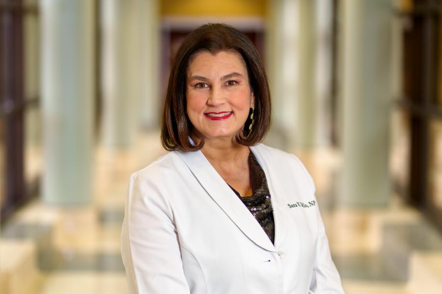 Sara Tello, a nurse practitioner at Texas Tech Physicians specializing in smoking cessation and tobacco dependency treatment, smiles while standing near her clinic..