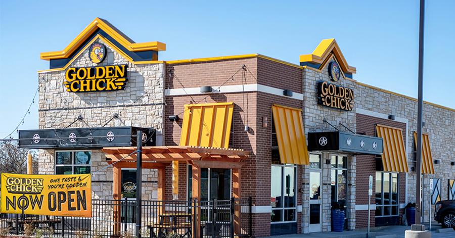 Photo of a Golden Chick store front on a sunny day.