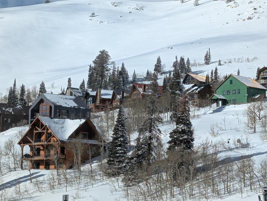 image of houses on a hill that will be cleaned by optima maids