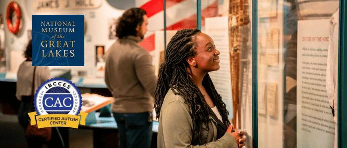 Visitors explore exhibits at the National Museum of the Great Lakes, showcasing maritime history and artifacts.