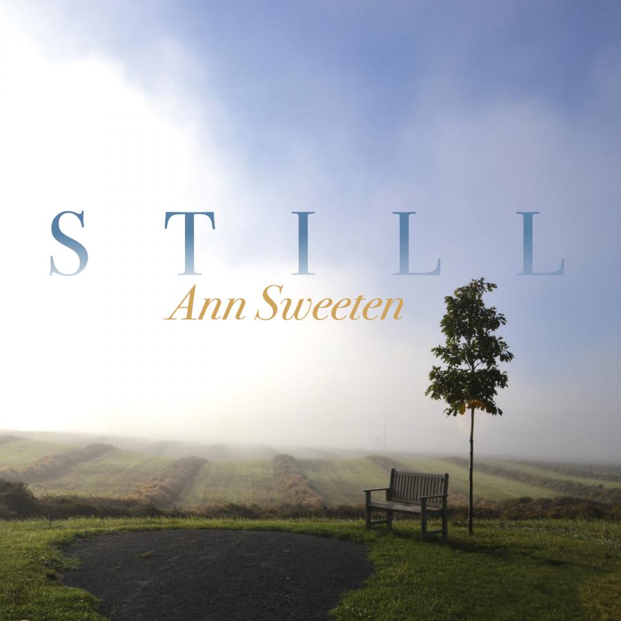 Pale blue and green pastoral scene with lone tree and cover title STILL