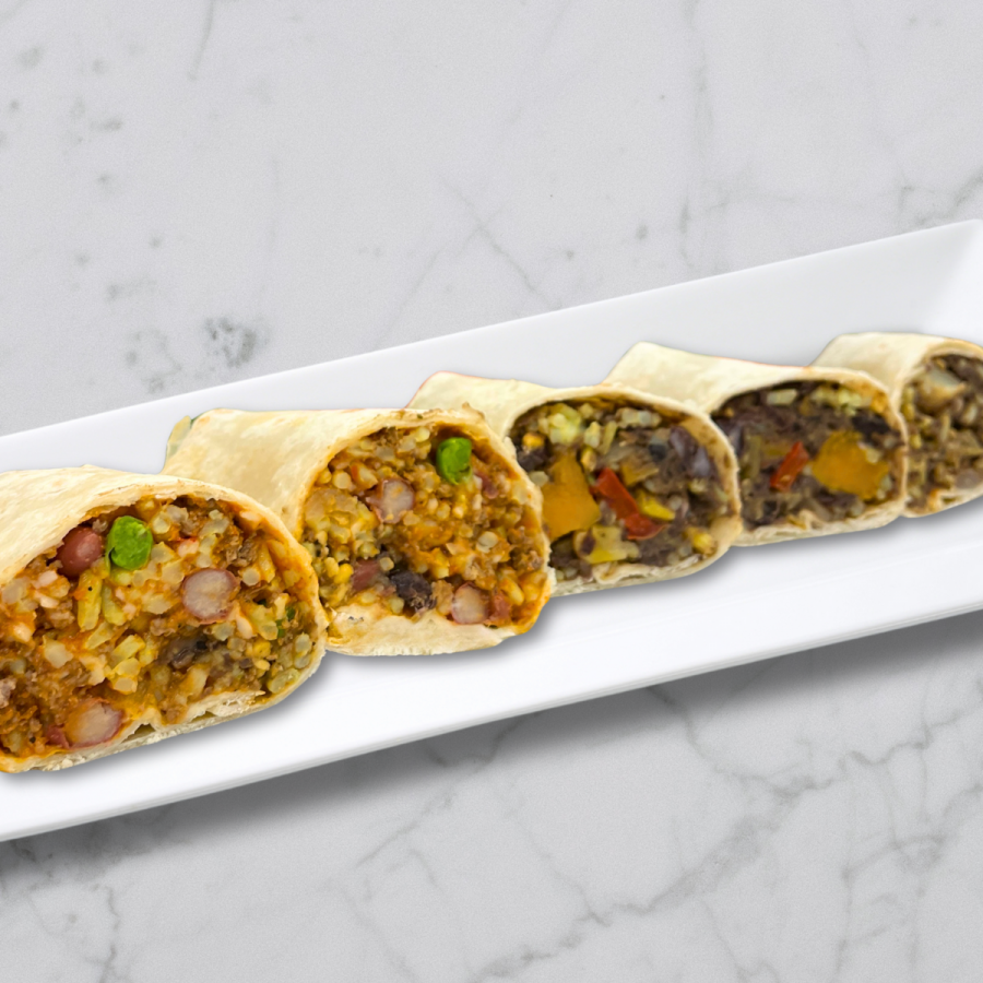 Five burrito halves neatly arranged in a diagonal row. Each burrito is cut cleanly to reveal a cross-section of its colorful filling.