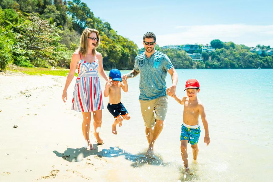 Christina and Adam Henson with sons Kayleb and Kesler—building a life of freedom, travel, and learning through Prosperity Of Life.