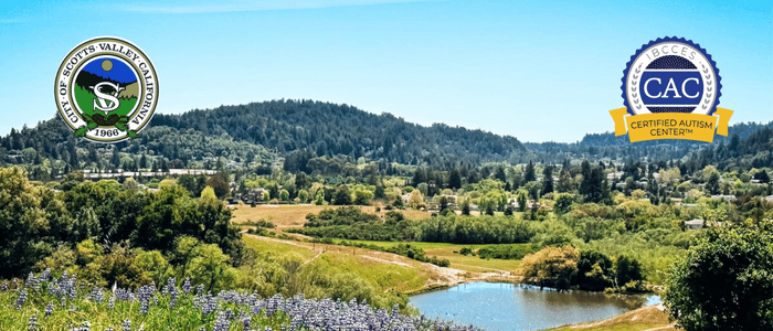 The International Board of Credentialing and Continuing Education Standards (IBCCES) proudly awards the Certified Autism Center™ (CAC) designation to the City of Scotts Valley, highlighting their ongoing commitment to accessibility and inclusivity Scenic view of Scotts Valley, California featuring lush hills, a lake, and logos for the city and Certified Autism Center.