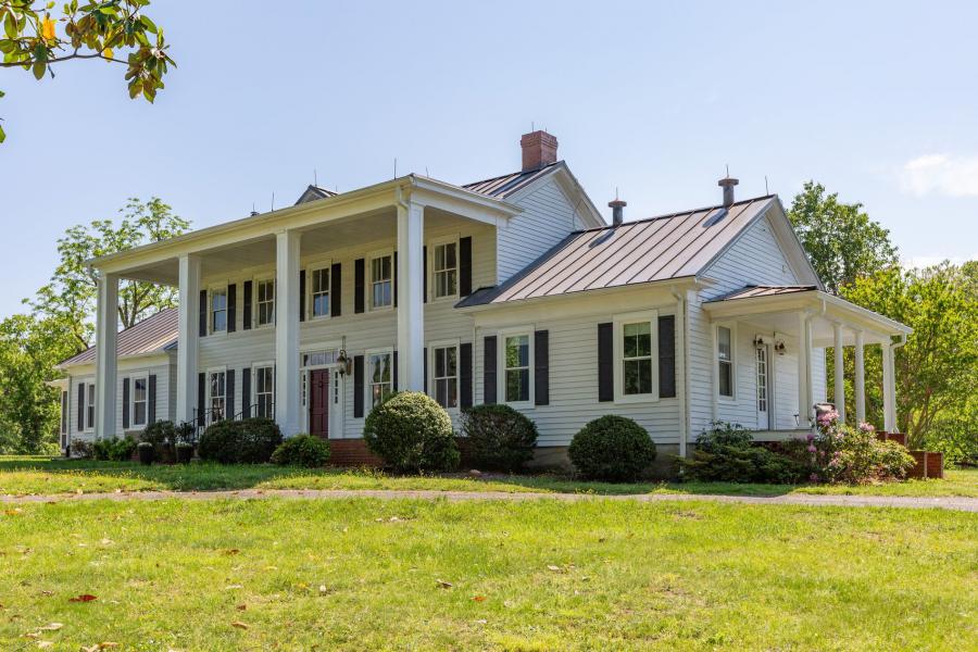 well maintained 5 BR/3.5 BA manor home and a pristine 3 BR/2 BA guest house (currently an Airbnb) in excellent condition on 22.46± total acres with 8 outbuildings/barns/garages/sheds/milking parlor, 900'± of Po River frontage, building potential