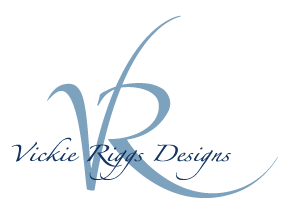 Vickie Riggs, the acclaimed jewelry designer, gemologist, and goldsmith known for transforming raw natural elements into striking wearable art, proudly announces the official introduction of her signature brand: Vickie Riggs Designs