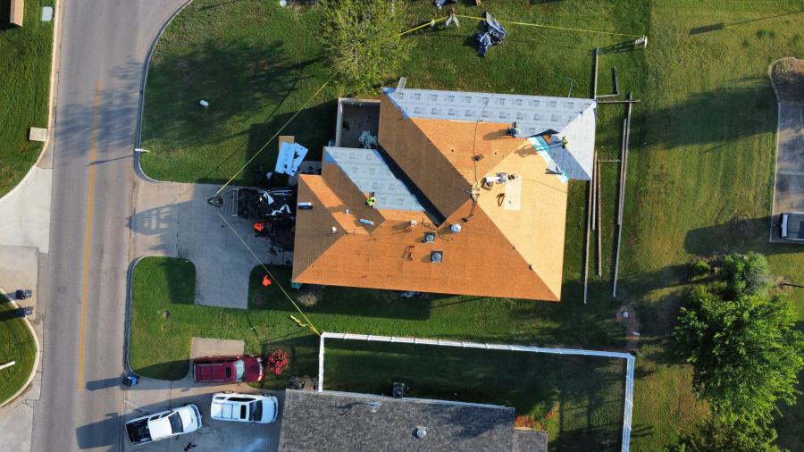 Before and after photos of a storm-damaged roof replacement in Oklahoma City