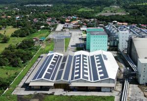 Aerial view of Solaren’s industrial solar installation at an AGI site, showing structural design suited to tropical weather conditions.