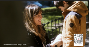 Otsego County Anti-Stigma image of moth zipping up son's coat