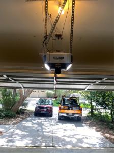 Local technician performing a heavy-duty garage door spring replacement near me.