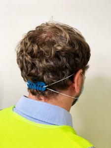 Detectable Reusable Ear Saver on Person