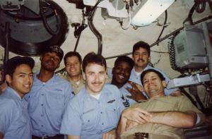 A picture of John Gregory Vincent with his shipmates underway on a nuclear submarine