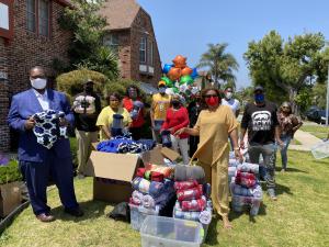 Executive Board and members of the New Frontier Democratic Club deliver 200 blankets