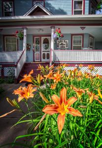 Holden House shares beautiful gardens with guest to the bed and breakfast inn