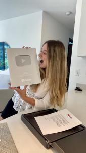 Sofia Web with her silver YouTube award