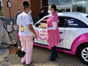 Tanja shares with Gloria Benton, RN Head Nurse in the Hematology/Oncology Clinic why she made the 30-day Chemotherapy Care Packages, "I made the packages to give the ladies something to do during their 3-4 hour chemo treatment"