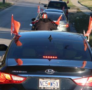 Bright orange flags signal participation in the second bimonthly KC Peace Ride.