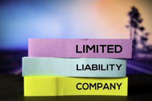 Limited Liability Company on the sticky notes with bokeh background