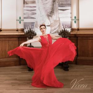 Woman Twirling in Red Dress - The Vixen Collection Cover Art