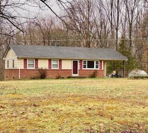 Solid 3 BR/1.5 BA ranch style home on 1.62 +/- acres -- Carport & storage sheds -- Great investment opportunity!!