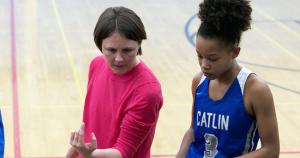 Kate Williams coaching Varsity Girls Basketball
