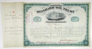 Standard Oil Trust 1882 Stock Certificate Signed by J.D. Rockefeller. New York, 1882. 500 Shares I/C Stock Certificate Issued to William G. Warden, S/N 318. Black text with green border, U.S. Capitol Building at top center. Signatures have been cancelled.